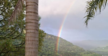 Rainbow Over House